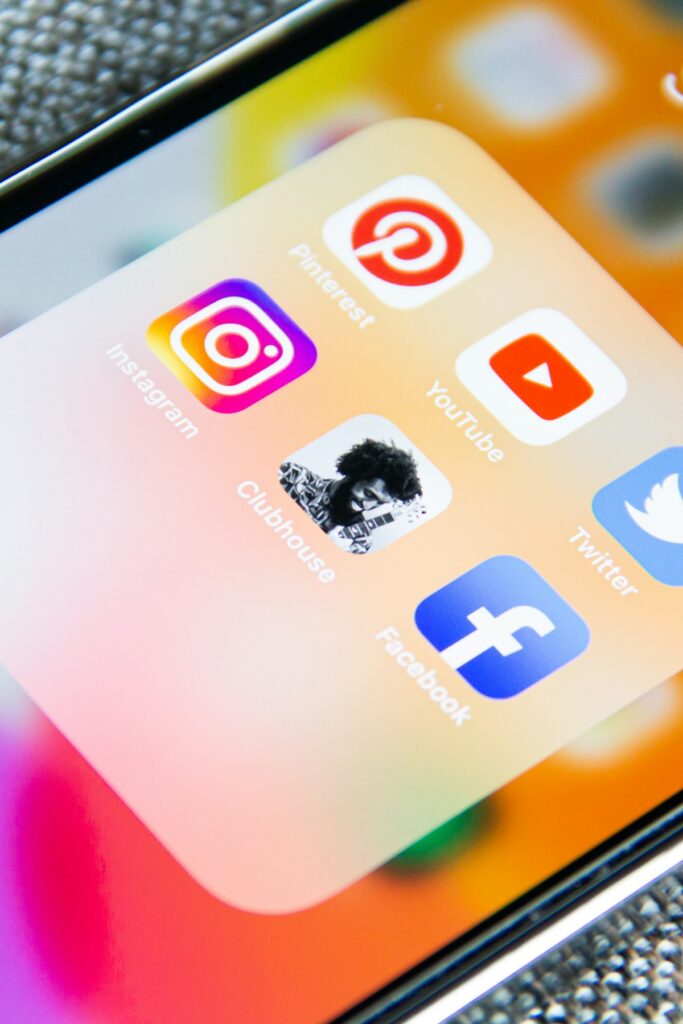 Pinterest boards and pins on a phone screen for blog marketing