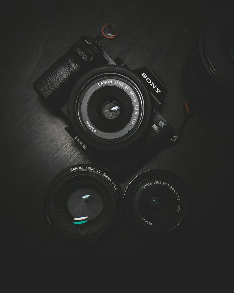 Camera and photography equipment on table for blog photography